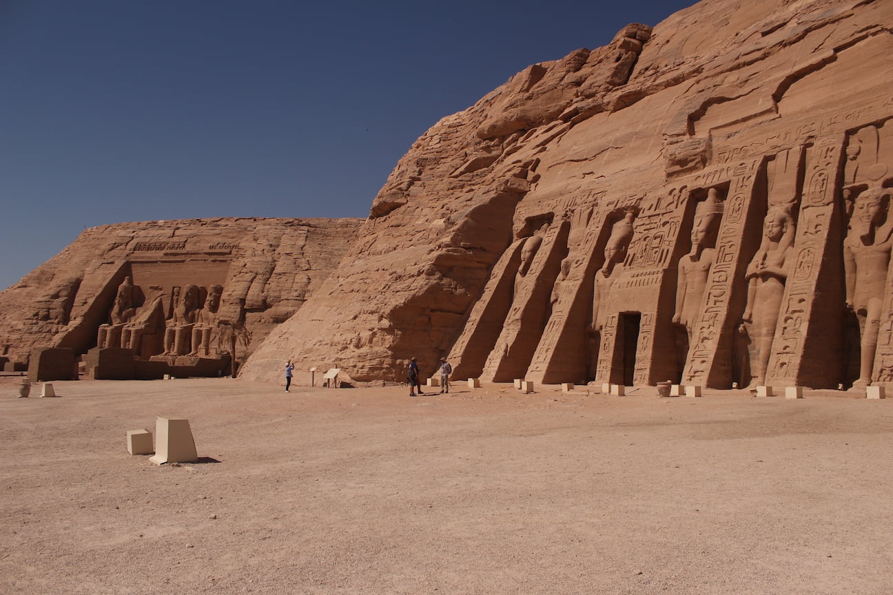 The two temples of Abu Simbel, with the smallest one closer and larger on the background