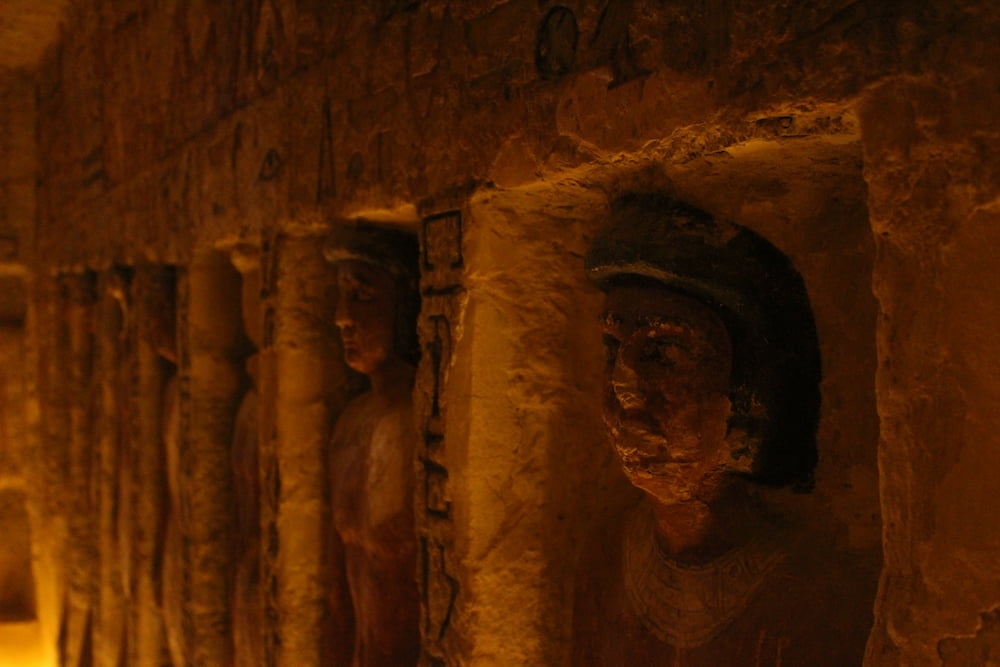 Line of statues of people, inside a tomb in Saqqara