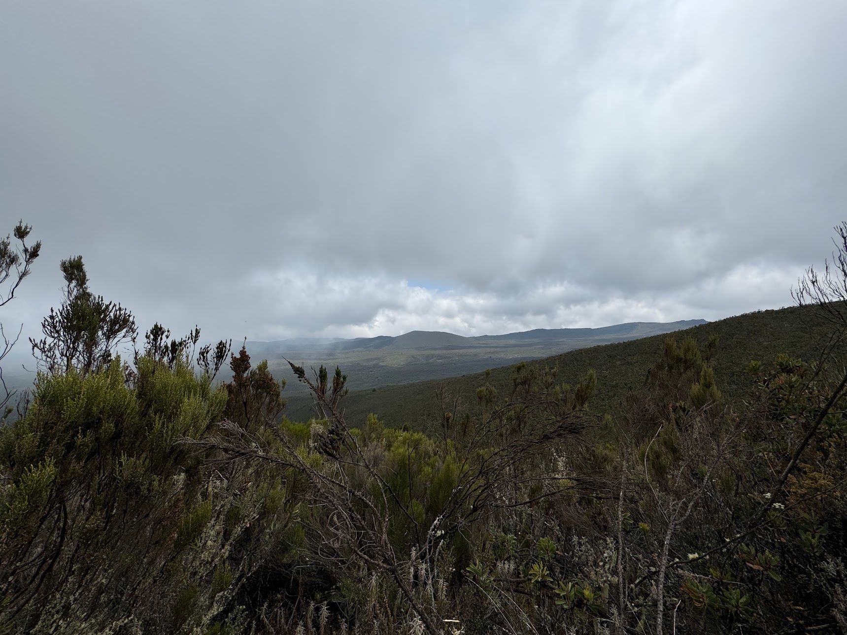 Landscape over the mountain, with the clouds starting to open up in the distance