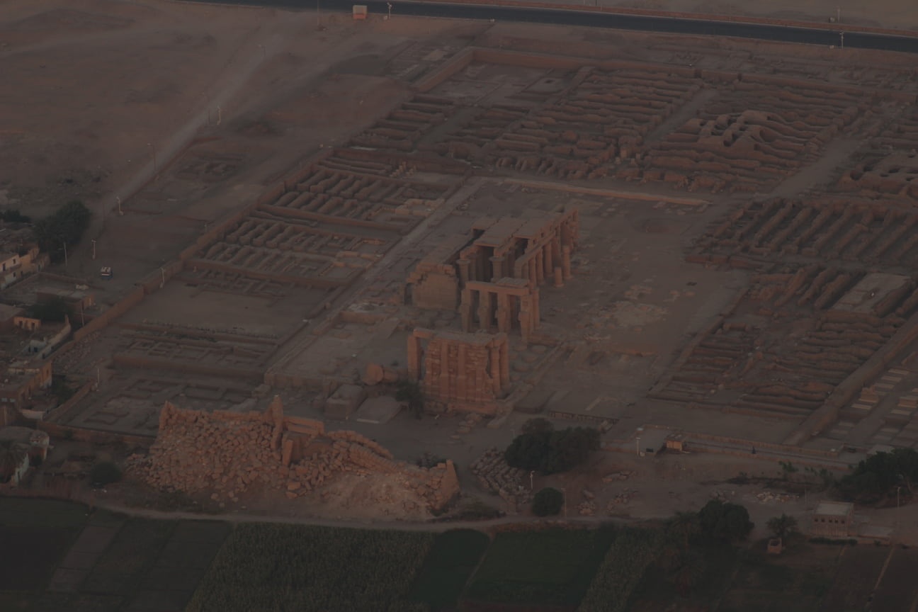 Temple in ruins photographed from hot air balloon, in Luxor, Egypt