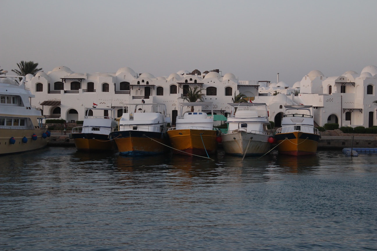 Five boats on a marina in Hurghada